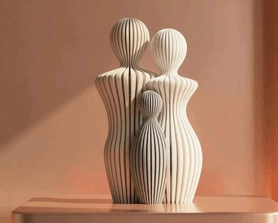 Couple & One Child Sculpture